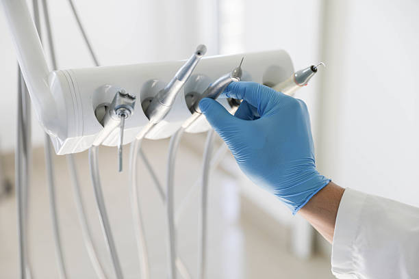 Professional Dental Implants technician working in Walls, MS
